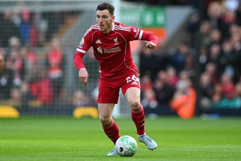 Liverpool's Scottish defender #26 Andrew Robertson looks to play a pass during the English Premier League football match between Liverpool and Fulham at Anfield in Liverpool, north west England on April 11, 2026.  ANDY BUCHANAN / AFP