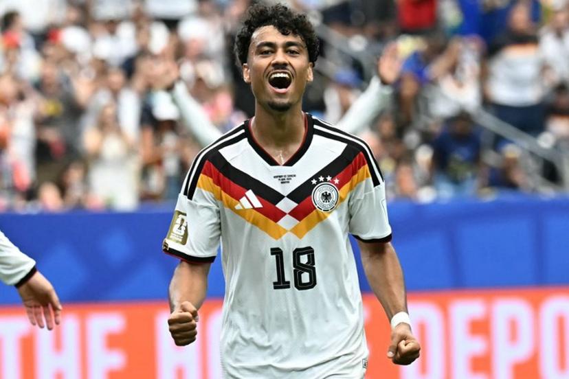 Germany's defender #18 Nathaniel Brown celebrates after scoring a goal during the 2026 World Cup Group E football match between Germany and Curacao at the Houston Stadium in Houston on June 14, 2026.   Paul ELLIS / AFP