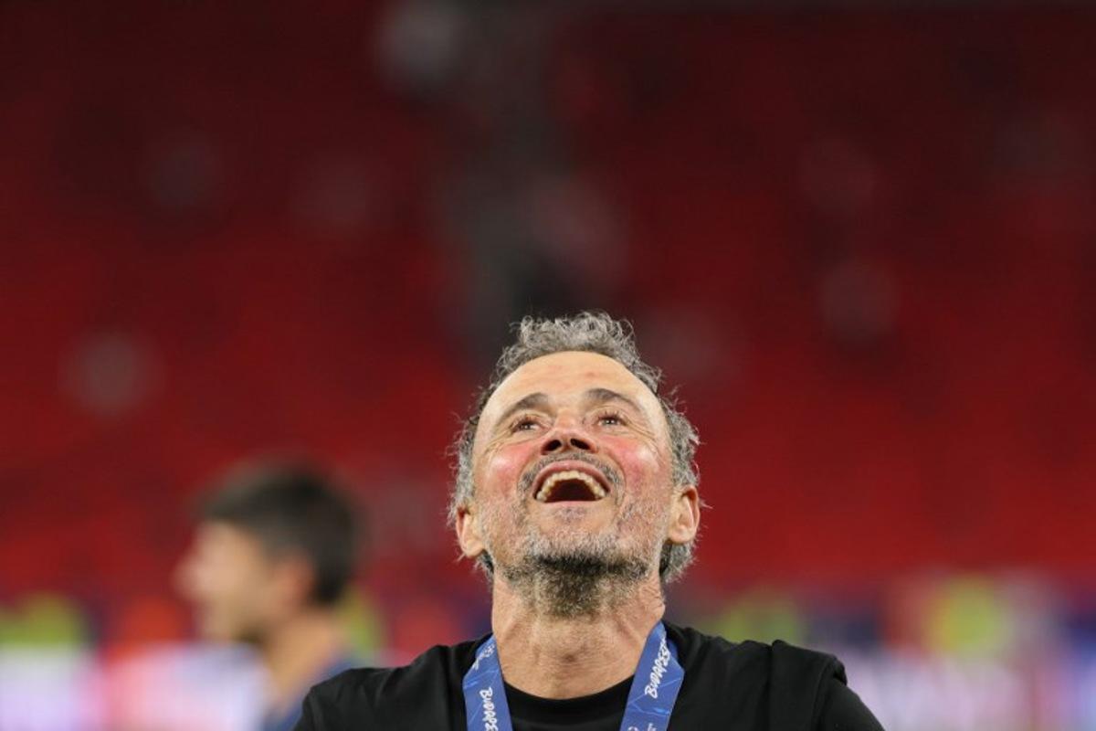 Paris Saint-Germain's Spanish head coach Luis Enrique celebrates winning the UEFA Champions League final football match between Paris Saint-Germain (PSG) and Arsenal FC at the Puskas Arena in Budapest on May 30, 2026.   Odd ANDERSEN / AFP
