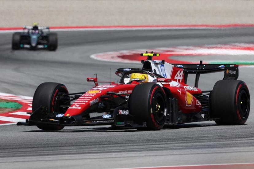 Ferrari's British driver Lewis Hamilton drives ahead of Mercedes' Italian driver Kimi Antonelli during the Catalonia Formula One Grand Prix at the Circuit de Catalunya in Montmelo, on the outskirts of Barcelona, on June 14, 2026.  Josep LAGO / AFP