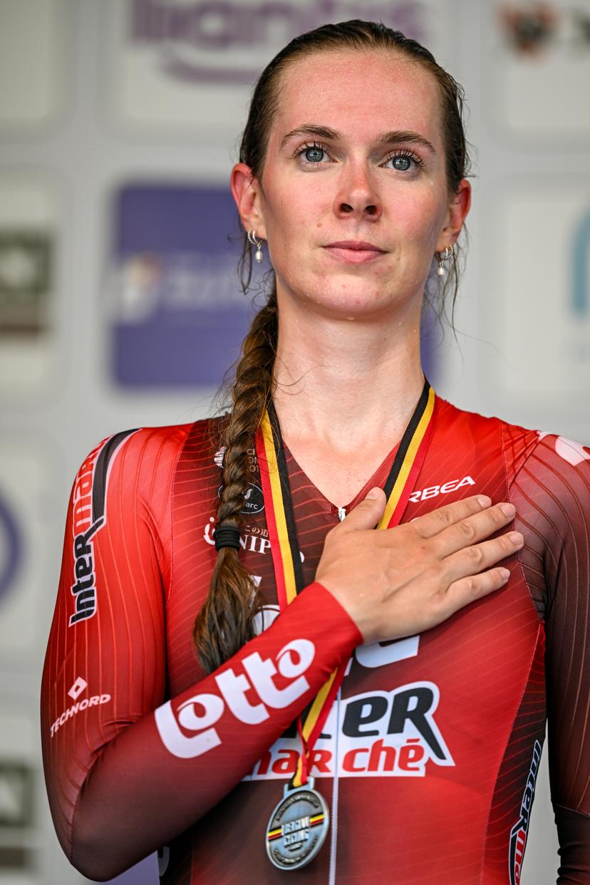 Belgian Sandrine Tas of Lotto‐ and Intermarche Ladies pictured on the podium after the women's elite individual road time trial race (20,5km) at the Belgian Cycling Championships, in Maarkedal, on Friday 26 June 2026. BELGA PHOTO DAVID PINTENS