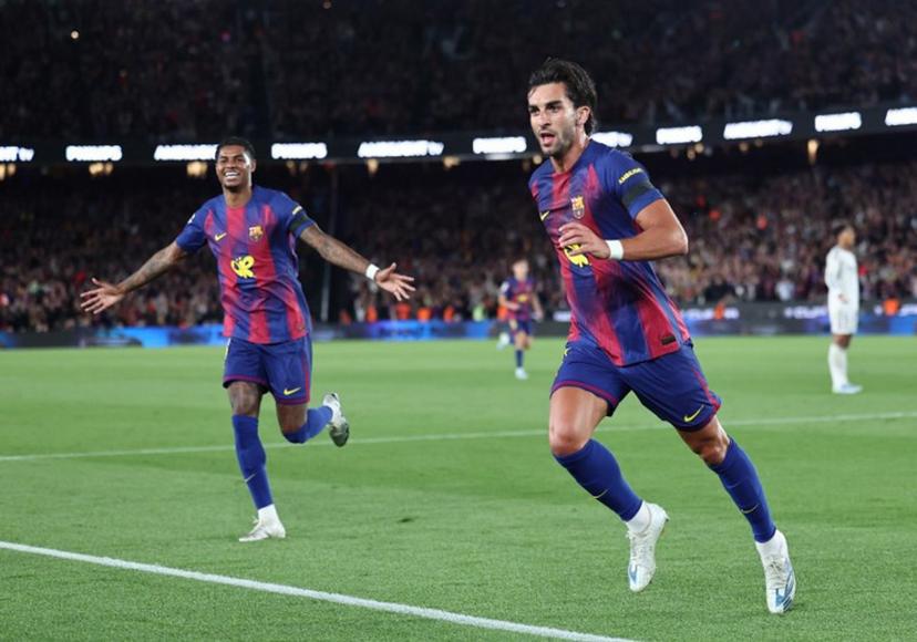 Barcelona's Spanish forward #07 Ferran Torres (R) celebrates scoring his team's second goal with Barcelona's English forward #14 Marcus Rashford during the Spanish league football match between FC Barcelona and Real Madrid CF at Camp Nou Stadium in Barcelona on May 10, 2026.  Josep LAGO / AFP