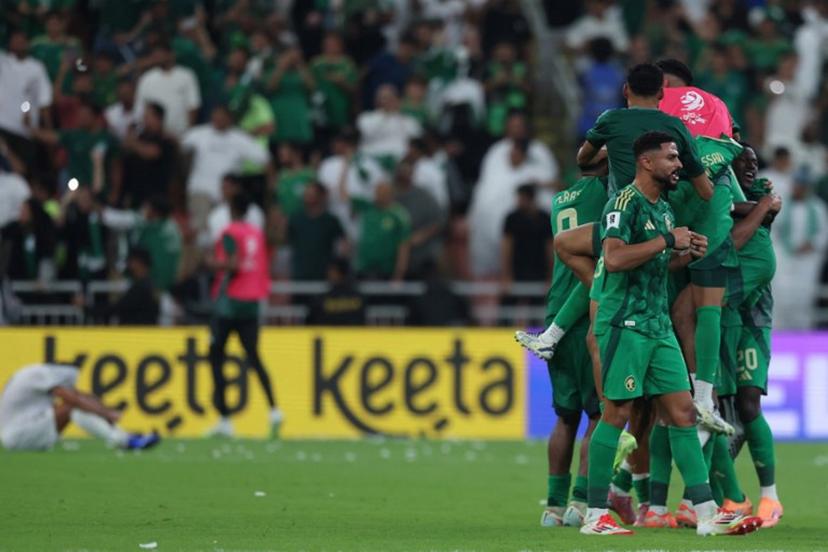 Saudi Arabia players celebrate after the FIFA World Cup 2026 Asian qualifier football match between Saudi Arabia and Iraq at King Abdullah Sports City in Jeddah on October 14, 2025.  Abdel Ghani BASHIR / AFP