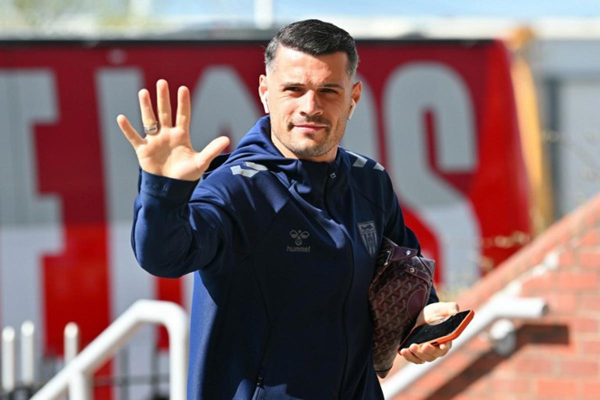 Sunderland's Swiss midfielder #34 Granit Xhaka arrives for the English Premier League football match between Sunderland and Tottenham Hotspur at The Stadium of Light in Sunderland in north east England on April 12, 2026.  ANDY BUCHANAN / AFP