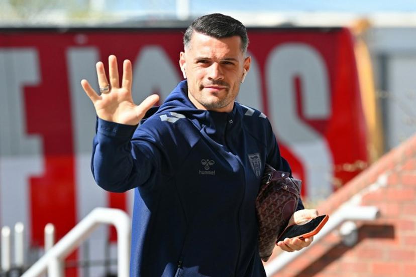 Sunderland's Swiss midfielder #34 Granit Xhaka arrives for the English Premier League football match between Sunderland and Tottenham Hotspur at The Stadium of Light in Sunderland in north east England on April 12, 2026.  ANDY BUCHANAN / AFP