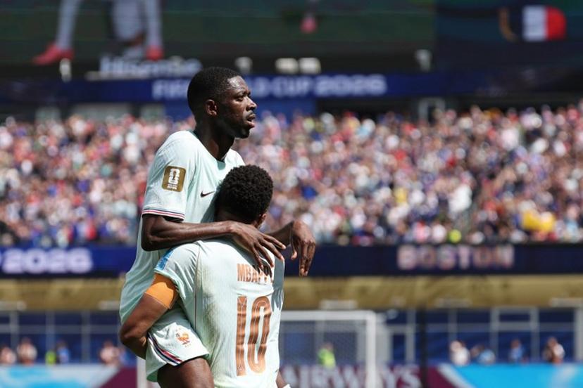 France's forward #07 Ousmane Dembele celebrates scoring his team's third goal with forward #10 Kylian Mbappe during the 2026 World Cup Group I football match between Norway and France at the Boston Stadium in Foxborough on June 26, 2026.  FRANCK FIFE / AFP