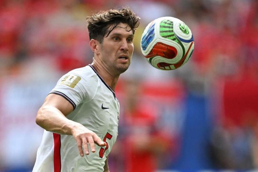 England's defender #05 John Stones looks at the ball during the 2026 World Cup football tournament quarter-final match between Norway and England at Miami Stadium in Miami Gardens on July 11, 2026.   MAURO PIMENTEL / AFP