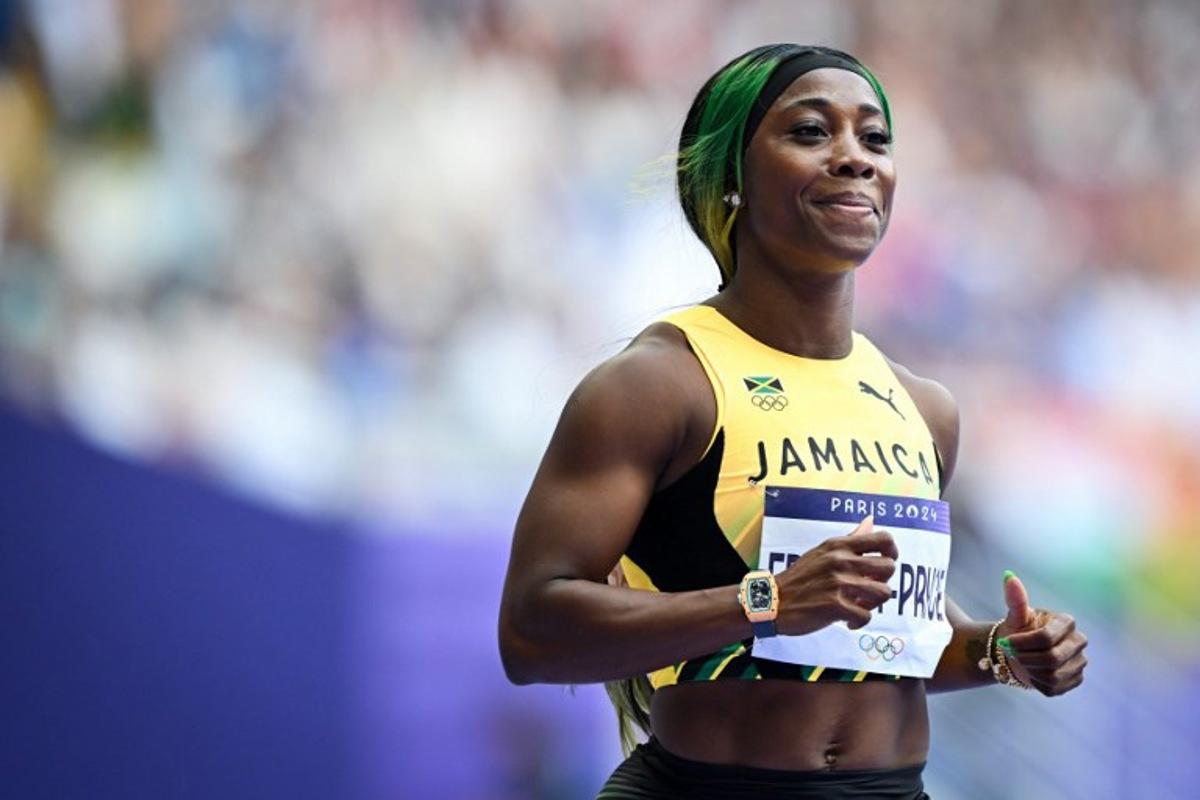 Jamaica's Shelly-Ann Fraser-Pryce competes in the women's 100m heat of the athletics event at the Paris 2024 Olympic Games at Stade de France in Saint-Denis, north of Paris, on August 2, 2024.  Andrej ISAKOVIC / AFP