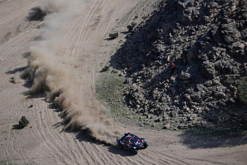 Toyota Gazoo Racing SA's South African driver Saood Variawa and French co-driver Francois Cazalet compete in the Stage 1 of the 48th edition of the Dakar Rally 2026, between Yanbu and Yanbu, Saudi Arabia, on January 4, 2026.  Giuseppe CACACE / AFP