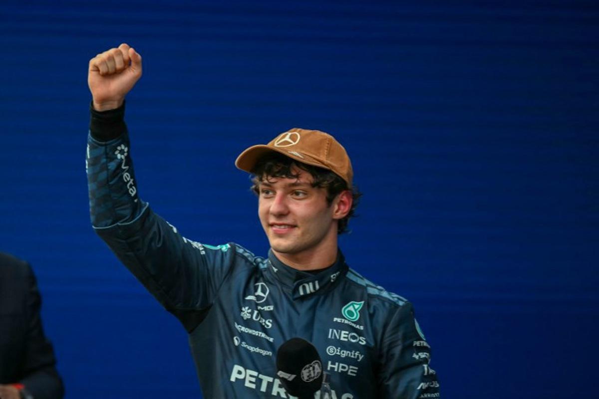 Mercedes' Italian driver Kimi Antonelli celebrates after winning the United States Formula One Grand Prix at the Circuit of the Americas in Austin, Texas, on October 25, 2026.  RONALDO SCHEMIDT / AFP
