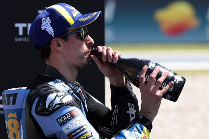 Team Gresini Racing MotoGP's Alex Marquez celebrates winning the Sprint Race at the Catalunya Moto GP Grand Prix at the Catalunya racetrack in Montmelo, near Barcelona, on May 16, 2026.  Lluis GENE / AFP