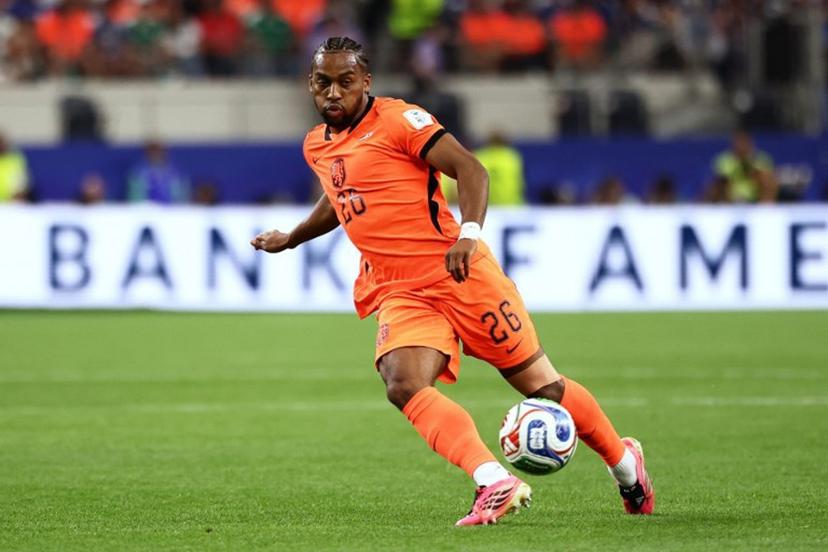 Netherlands' midfielder #26 Quinten Timber controls the ball during the 2026 World Cup Group F football match between the Netherlands and Japan at the Dallas Stadium in Arlington on June 14, 2026.   Aric Becker / AFP