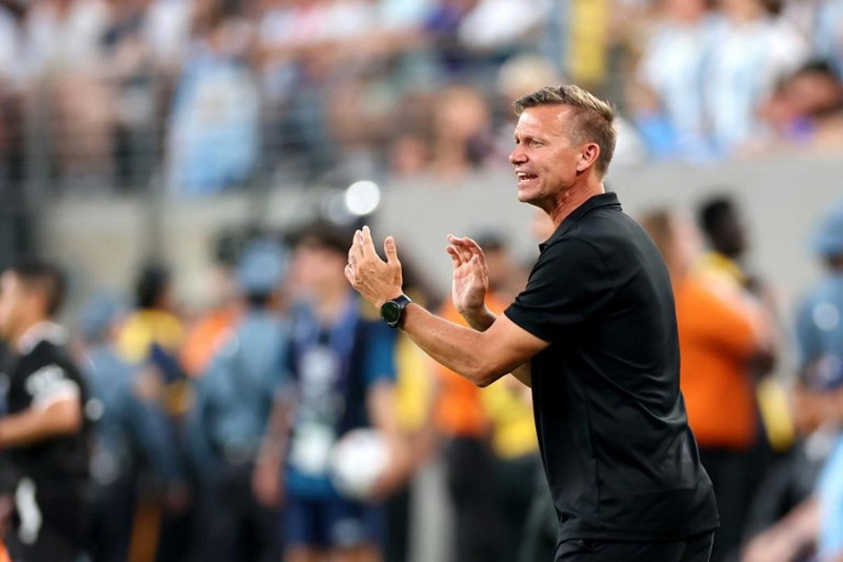 Canada's US coach Jesse Marsch shouts instructions to his players from the touchline during the Conmebol 2024 Copa America tournament semi-final football match between Argentina and Canada at MetLife Stadium, in East Rutherford, New Jersey on July 9, 2024.  CHARLY TRIBALLEAU / AFP