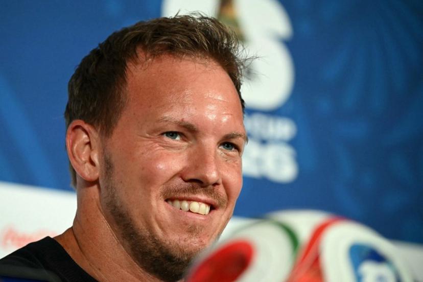 Germany's head coach Julian Nagelsmann smiles during a press conference at the Houston Stadium in Houston on June 13, 2026, on the eve of the 2026 World Cup football match between Germany and Curacao.   RONALDO SCHEMIDT / AFP