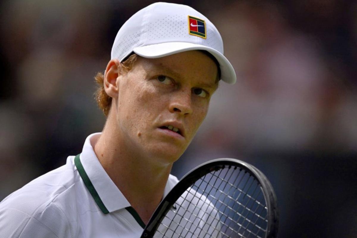 Italy's Jannik Sinner reacts as he plays against Serbia's Miomir Kecmanovic during their men's singles first round tennis match on the first day of the 2026 Wimbledon Championships at The All England Lawn Tennis and Croquet Club in Wimbledon, southwest London, on June 29, 2026.  Glyn KIRK / AFP