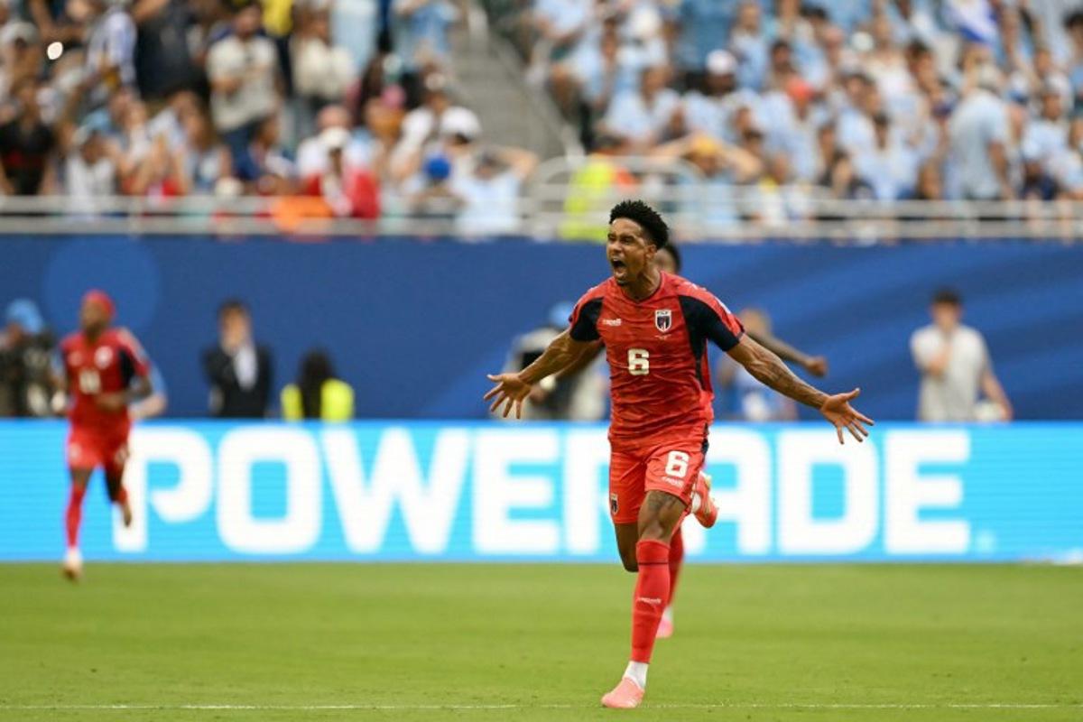 Cape Verde's midfielder #06 Kevin Pina celebrates after scoring his team's first goal during the 2026 World Cup Group H football match between Uruguay and Cape Verde at the Miami Stadium in Miami Gardens on June 21, 2026.   CHANDAN KHANNA / AFP