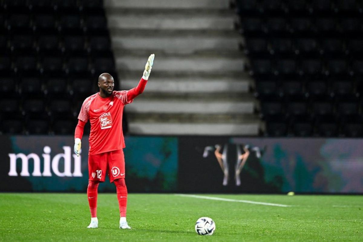 Angers' Burkinabe goalkeeper #12 Herve Koffi gestures during the French L1 football match between SCO Angers and Lille LOSC at the Raymond-Kopa Stadium in Angers, western France, on February 22, 2026.  JEAN-FRANCOIS MONIER / AFP
