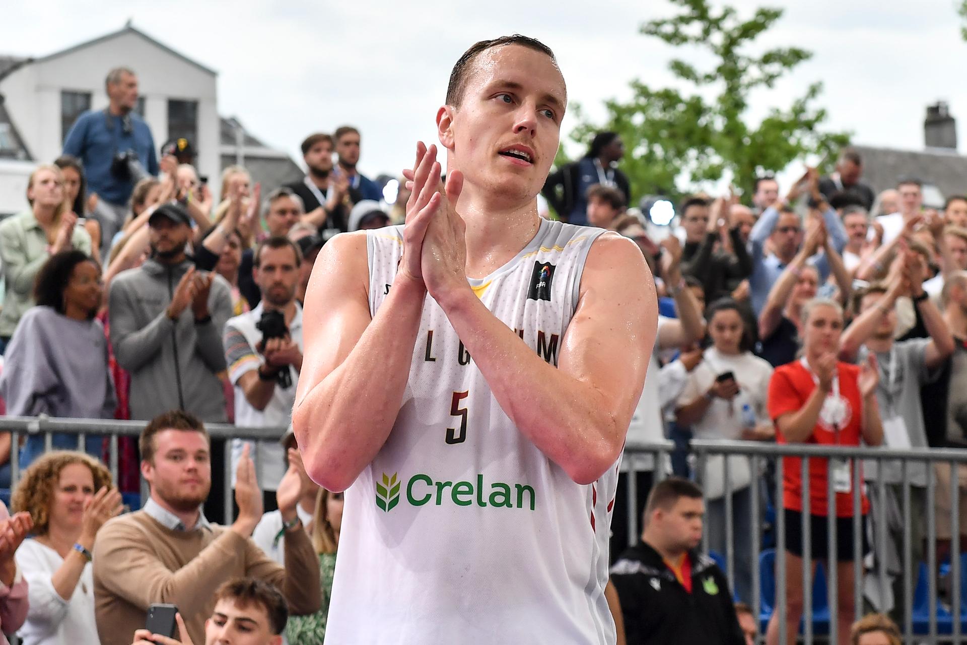 Belgium's Nick Celis thanks supporters after they lost in the extra-time a 3x3 basketball game between Belgium and France, in the Men's bronze medal game, at the FIBA 2022 world cup, Sunday 26 June 2022, in Antwerp. The FIBA 3x3 Basket World Cup 2022 takes place from 21 to 26 June in Antwerp. BELGA PHOTO DIRK WAEM