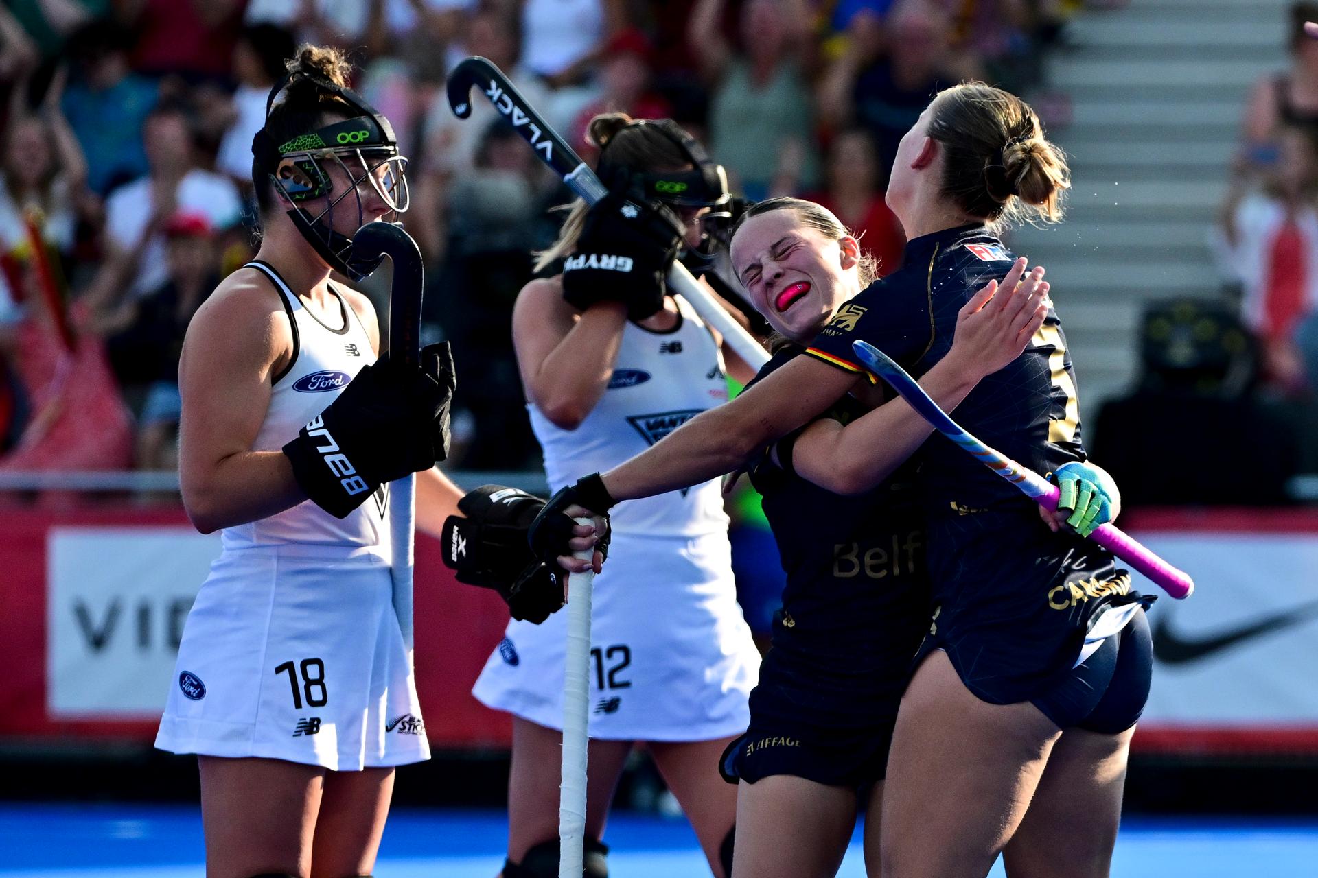 Belgium's Famke van Heel and Belgium's Justine Rasir celebrate after scoring during a hockey game between Belgium's Red Panthers and New Zealand, the first (out of three) matches during the group stage of the women 2026 Hockey World Cup, Sunday 16 August 2026 in Wavre. The 2026 edition of the Hockey World Cup takes place in Belgium and The Netherlands from August 15 to August 30. BELGA PHOTO DIRK WAEM