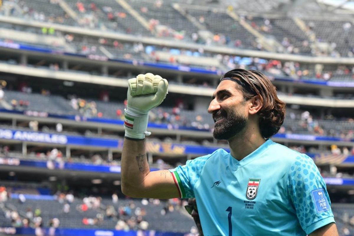 Iran's goalkeeper #01 Alireza Beiranvand celebrates at the end of the 2026 World Cup Group G football match between Belgium and Iran at the Los Angeles Stadium in Inglewood on June 21, 2026.   Frederic J. Brown / AFP