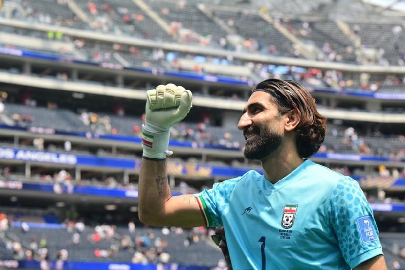 Iran's goalkeeper #01 Alireza Beiranvand celebrates at the end of the 2026 World Cup Group G football match between Belgium and Iran at the Los Angeles Stadium in Inglewood on June 21, 2026.   Frederic J. Brown / AFP