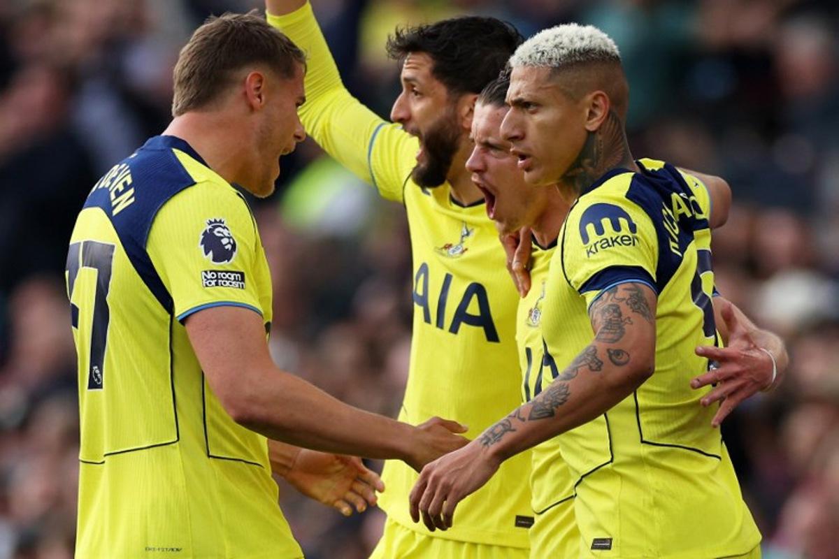 Tottenham Hotspur's English midfielder #22 Conor Gallagher (2R) celebrates scoring the team's first goal with teammates during the English Premier League football match between Aston Villa and Tottenham Hotspur at Villa Park in Birmingham, central England on May 3, 2026.  Adrian Dennis / AFP