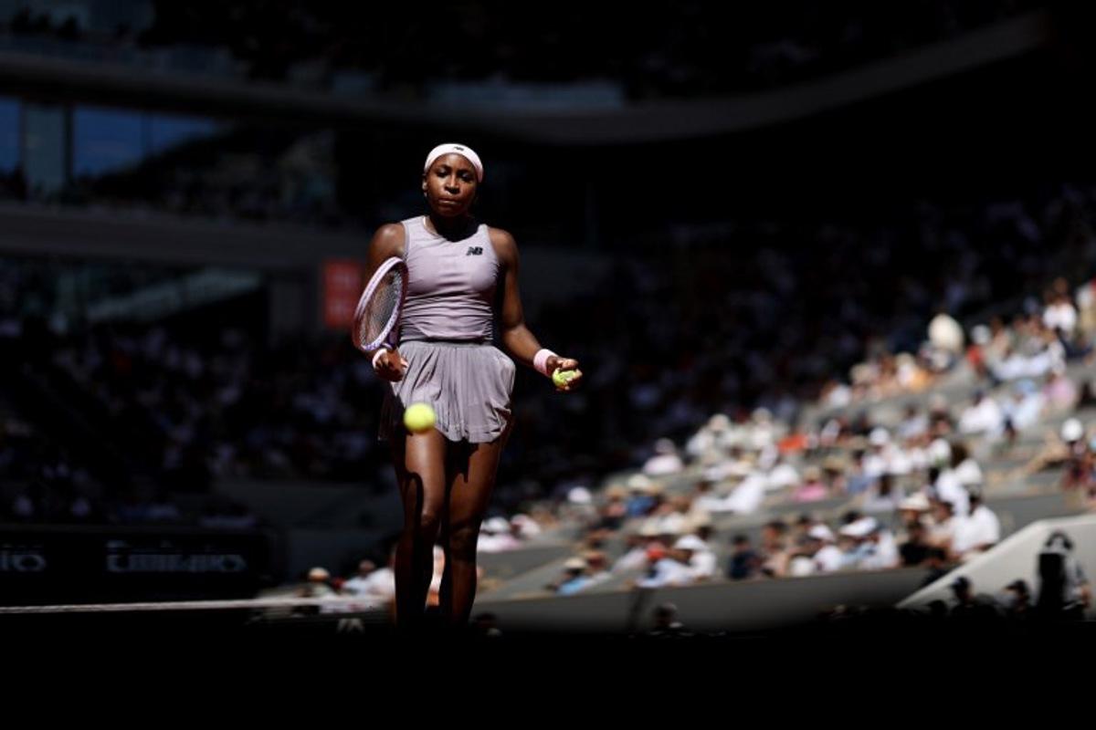 US Coco Gauff prepares to serve to US Taylor Townsend during their women's singles match on day 3 of the French Open tennis tournament on Court Philippe-Chatrier at the Roland-Garros Complex in Paris on May 26, 2026.  Anne-Christine POUJOULAT / AFP