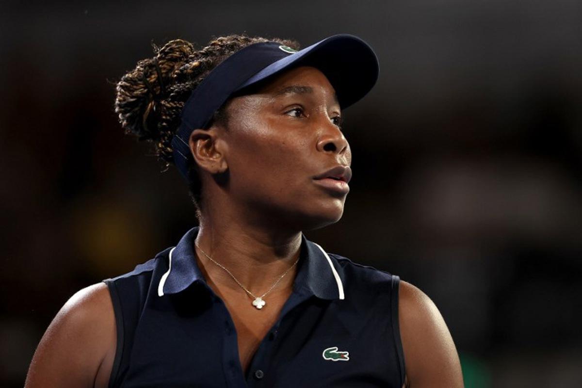 USA's Venus Williams reacts on a point to Serbia's Olga Danilovic during their women's singles match on day one of the Australian Open tennis tournament in Melbourne on January 18, 2026.  Martin KEEP / AFP