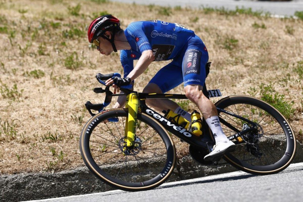 Team Visma Lease a Bike Danish rider Jonas Vingegaard during the 14th stage of the Giro d'Italia 2026 - Tour of Italy cycling race between Aosta and Pila (Gressan), Italy, on May 23, 2026.  Luca Bettini / AFP