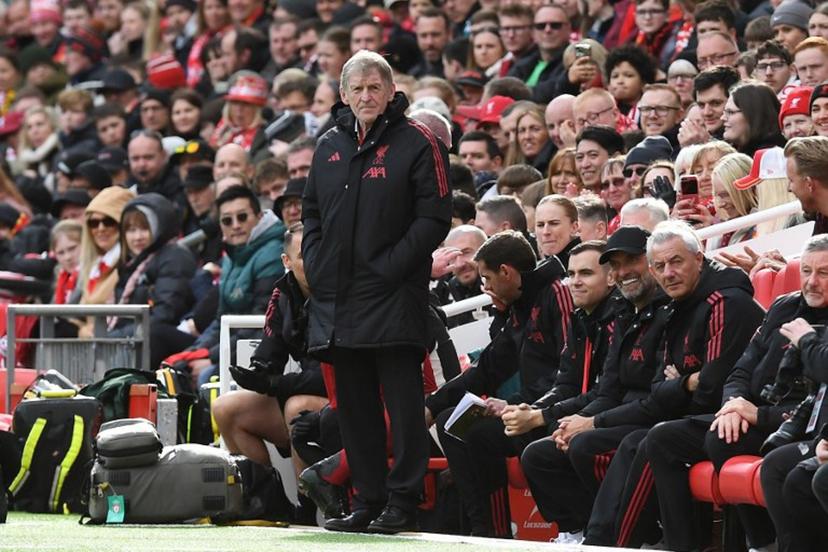 Liverpool Legends' manager Kenny Dalglish (C) looks on during the Legends football match between Liverpool Legends and Dortmund Legends at Anfield in Liverpool, north-west England on March 28, 2026.  PETER POWELL / AFP