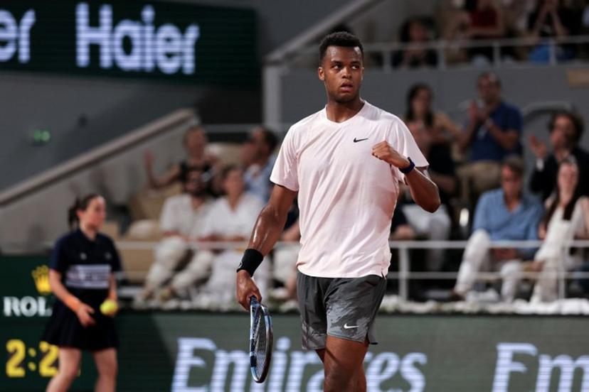 France's Giovanni Mpetshi Perricard reacts after a point as he plays against Serbia's Novak Djokovic during their men's singles match on day 1 of the French Open tennis tournament on Court Philippe-Chatrier at the Roland-Garros Complex in Paris on May 24, 2026.  Thomas SAMSON / AFP
