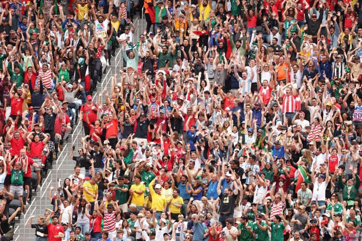 Canadian fans cheer for their team during the 2026 World Cup round of 32 football match between South Africa and Canada at the Los Angeles Stadium in Inglewood on June 28, 2026.   ETIENNE LAURENT / AFP