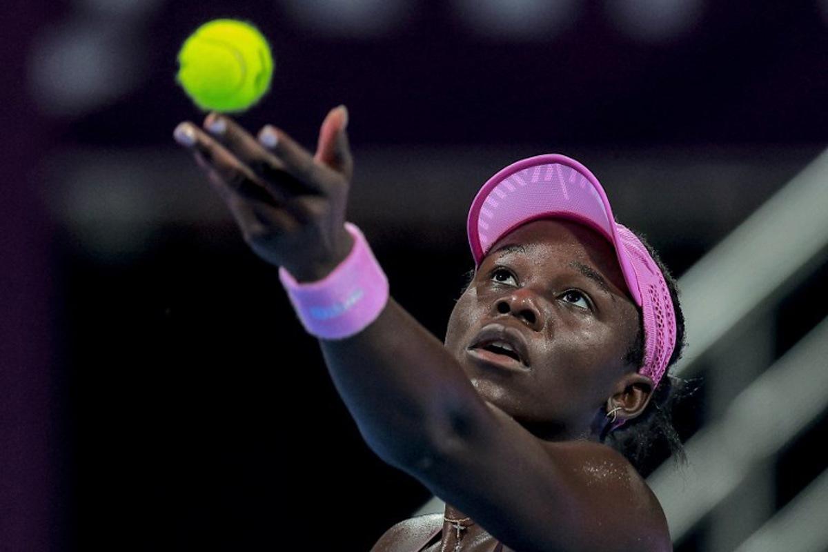 Canada's Victoria Mboko serves to Czech Republic's Karolina Muchova during their women's singles final match at the Qatar Open tennis tournament in Doha on February 14, 2026.  Karim JAAFAR / AFP