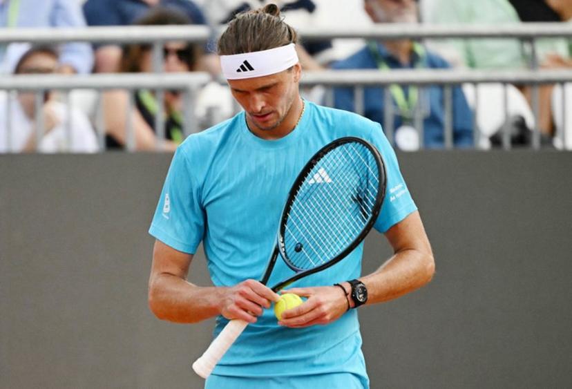 Germany's Alexander Zverev reacts during the match against Italy's Luciano Darderi during the ATP Rome Open tennis tournament at Foro Italico in Rome on May 12, 2026.   Andreas SOLARO / AFP