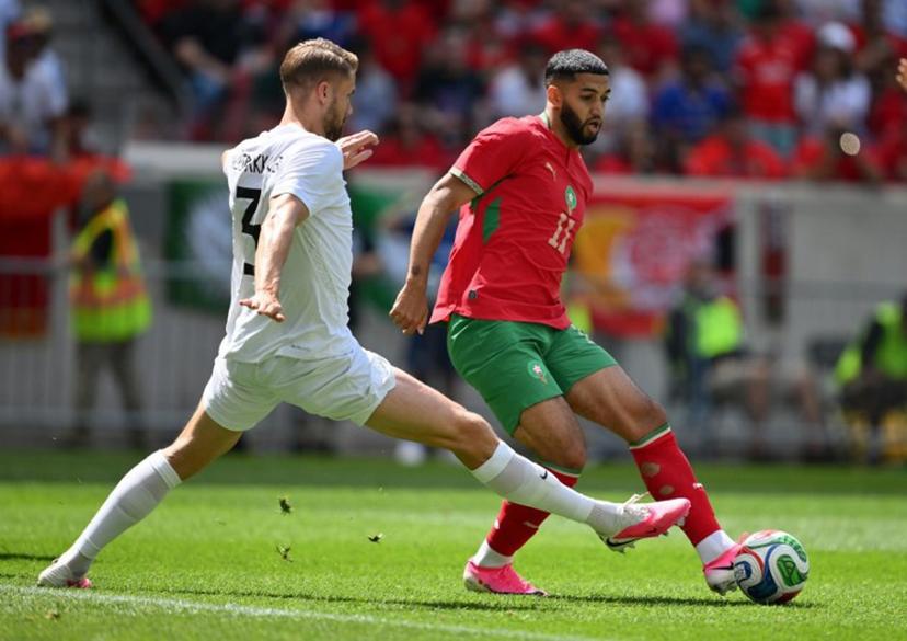 Morocco's midfielder #11 Ismael Saibari is challenged by Norway's defender #3 Kristoffer Ajer during the international friendly football match between Morocco and Norway at Sports Illustrated Stadium in Harrison, New Jersey, on June 7, 2026.  ANGELA WEISS / AFP