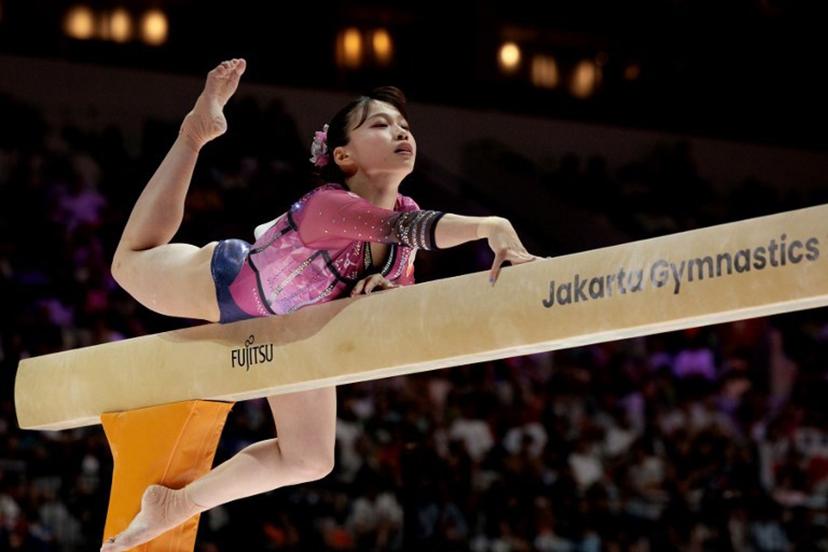 Japan's Aiko Sugihara competes during the women's balance beam final at the 53rd FIG Artistic Gymnastics World Championships in Jakarta on October 25, 2025.  YASUYOSHI CHIBA / AFP