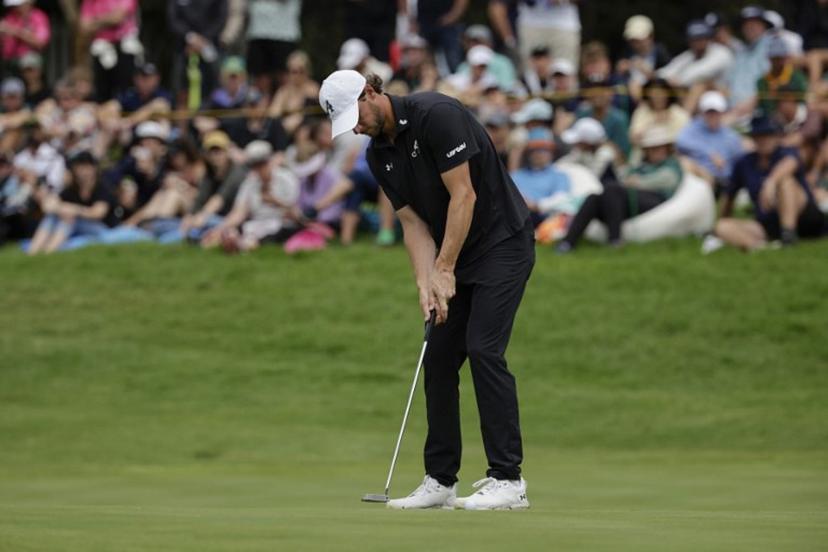 4Aces GC's Belgian player Thomas Pieters holes a putt on the 16th green of the fourth day of the LIV Golf South Africa tournament at The Club in Steyn City on March 22, 2026.  WIKUS DE WET / AFP