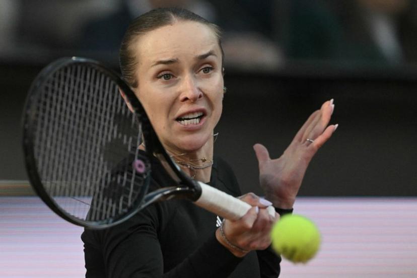 Ukraine's Elina Svitolina hits a return to USA's Coco Gauff during the WTA Rome Open tennis tournament final at Foro Italico in Rome on May 16, 2026.   Tiziana FABI / AFP