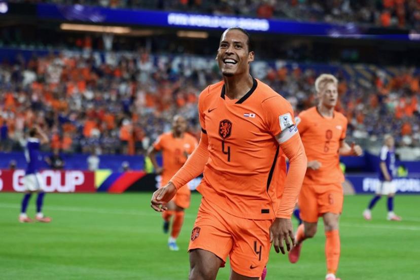 Netherlands' defender #04 Virgil van Dijk celebrates after scoring the opening goal during the 2026 World Cup Group F football match between the Netherlands and Japan at the Dallas Stadium in Arlington on June 14, 2026.    Aric Becker / AFP