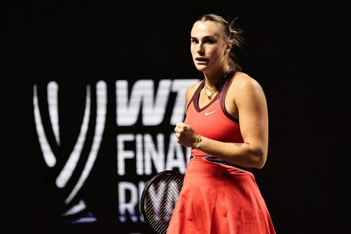 Belarus' Aryna Sabalenka reacts after a point against USA's Jessica Pegula during their tennis match at the WTA Finals in Riyadh on November 4, 2025.  Fayez NURELDINE / AFP