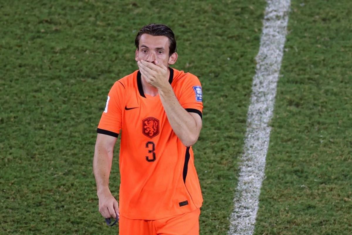 Netherlands' midfielder #03 Marten de Roon reacts after losing at the end of the 2026 World Cup round of 32 football match between the Netherlands and Morocco at the Monterrey Stadium in Guadalupe on June 29, 2026.   Julio Cesar AGUILAR / AFP