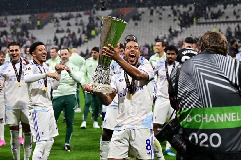 Belgium's midfielder #08 Youri Tielemans celebrates with the trophy after winning the UEFA Europa League final football match between SC Freiburg and Aston Villa at Besiktas Park in Istanbul on May 20, 2026.  YASIN AKGUL / AFP