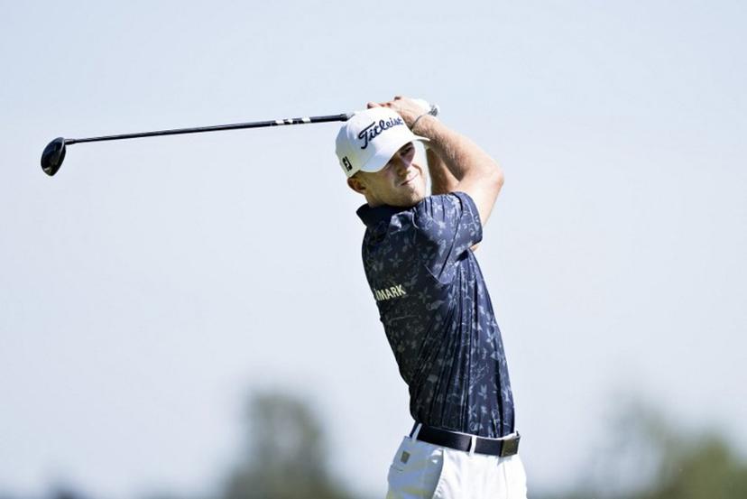 Denmark's Frederik Kjettrup competes in the final of the 'Made in HimmerLand 2023' golf tournament in Farsoe on July 9, 2023.   Henning Bagger / Ritzau Scanpix / AFP