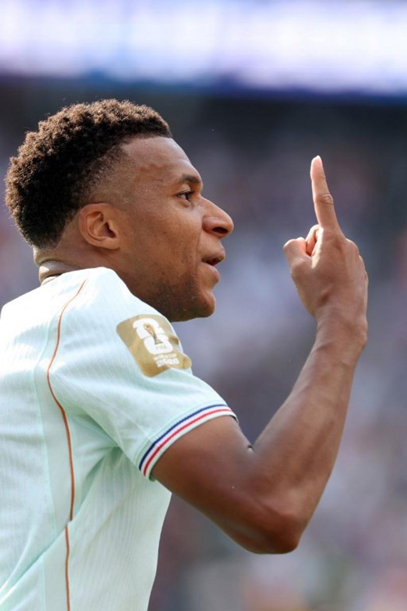 France's forward #10 Kylian Mbappe celebrates scoring his team's first goal during the 2026 World Cup football tournament quarter-final match between France and Morocco at Boston Stadium in Foxborough on July 9, 2026.   Odd ANDERSEN / AFP