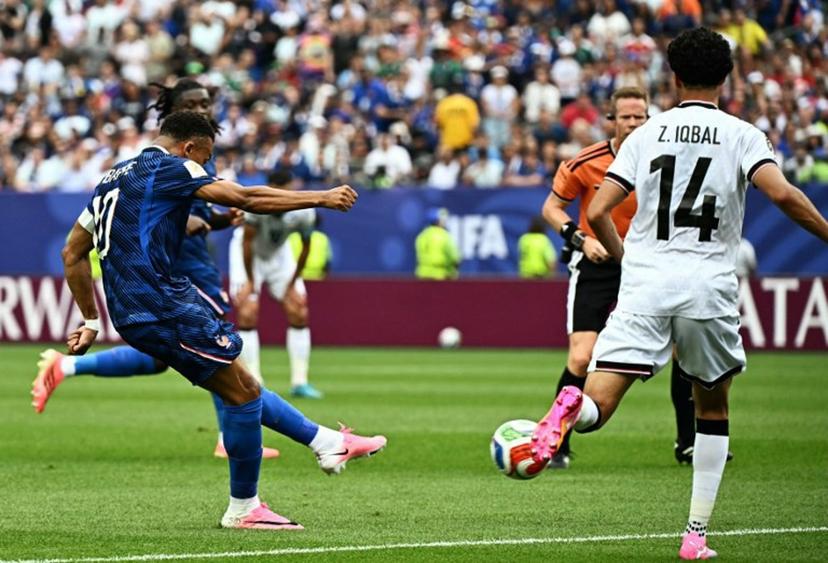 France's forward #10 Kylian Mbappe scores his team's first goal during the 2026 World Cup Group I football match between France and Iraq at the Philadelphia Stadium in Philadelphia on June 22, 2026.   Jewel SAMAD / AFP