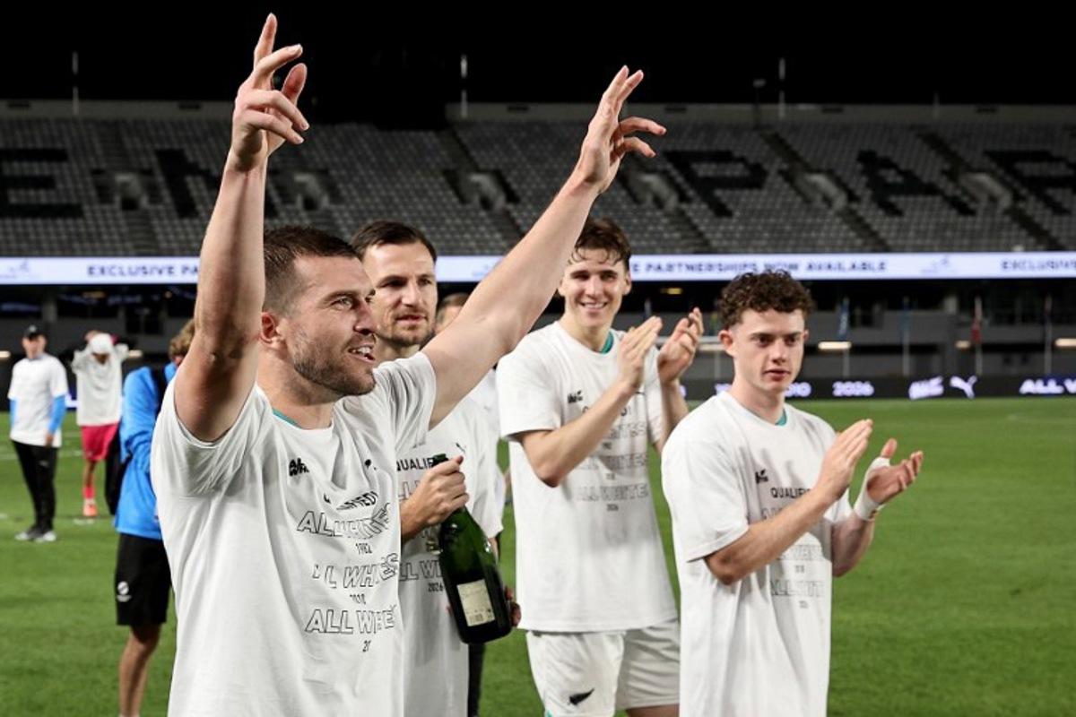 (FILES) New Zealand's Tim Payne celebrates after their victory during the FIFA World Cup 2026 Oceania qualifiers group final football match between New Zealand and New Caledonia at Eden Park Stadium in Auckland on March 24, 2025. New Zealand's World Cup-bound Tim Payne said on May 29, 2026, it was "pretty crazy" to have become the country's most followed football account after an influencer identified him as the "least known" player in the competition and called for fans to boost his posts. DAVID ROWLAND / AFP