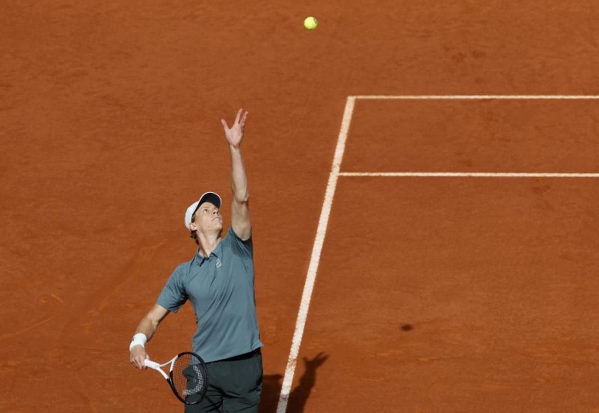 Italy's Jannik Sinner serves to Germany's Alexander Zverev during the 2026 ATP Tour Madrid Open tennis tournament final singles match at the Caja Magica in Madrid, on May 3, 2026.  Oscar DEL POZO / AFP