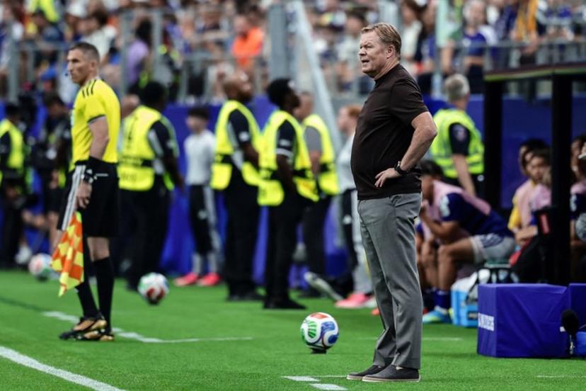Netherlands' head coach Ronald Koeman stands on the pitch line during the 2026 World Cup Group E football match between Germany and Curacao at the Houston Stadium in Houston on June 14, 2026.   Aric Becker / AFP