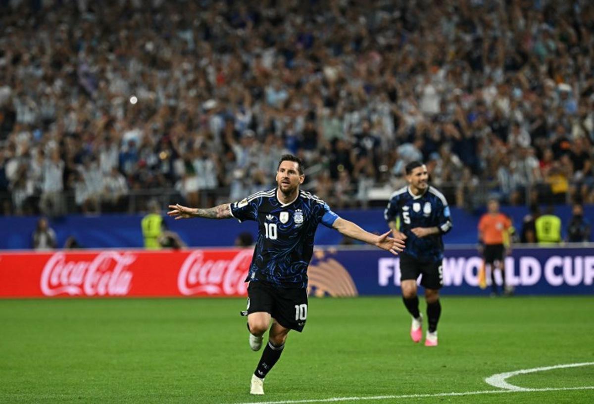 Argentina's forward #10 Lionel Messi celebrates scoring his team's third goal during the 2026 World Cup Group J football match between Jordan and Argentina at the Dallas Stadium in Arlington on June 27, 2026.   Paul ELLIS / AFP