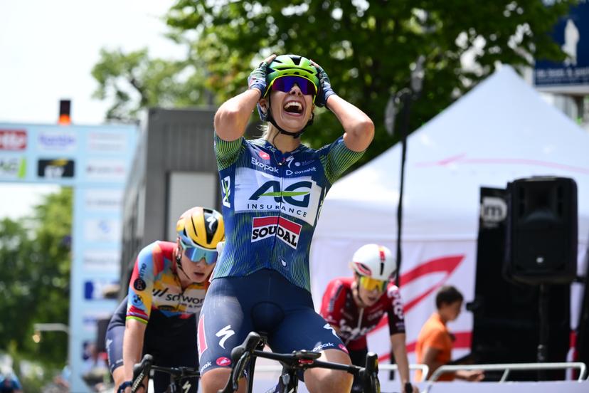 Shari Bossuyt of AG Insurance-Soudal Team (C) celebrates as she crosses the finish line to win, before Lotte Kopecky of SD Worx-Protime (L) the sprint at the finish of the women's elite race (137km) at the Belgian Cycling Championships, in Brasschaat, on Sunday 28 June 2026. BELGA PHOTO TOM GOYVAERTS